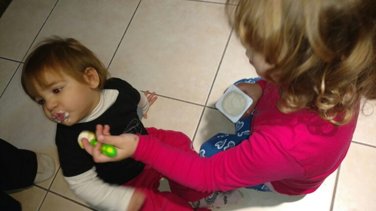 Nefelini feeds Zoe! 