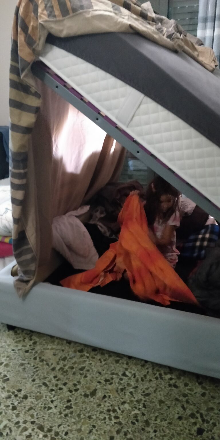 Making a house with papa and maman’s bed